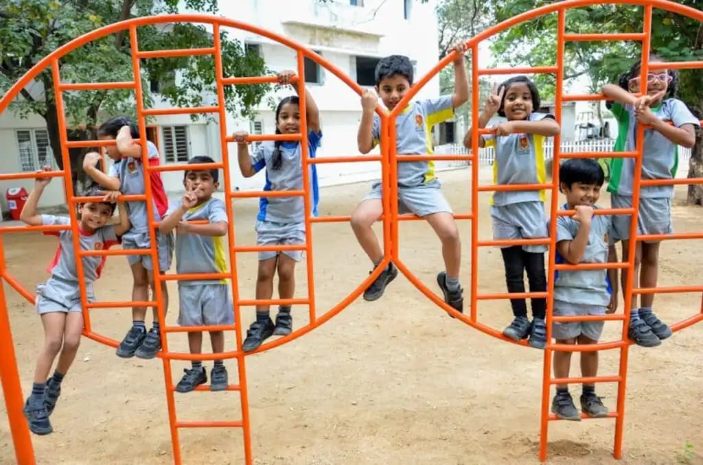 Young Suchitra pupils playing on the school grounds
