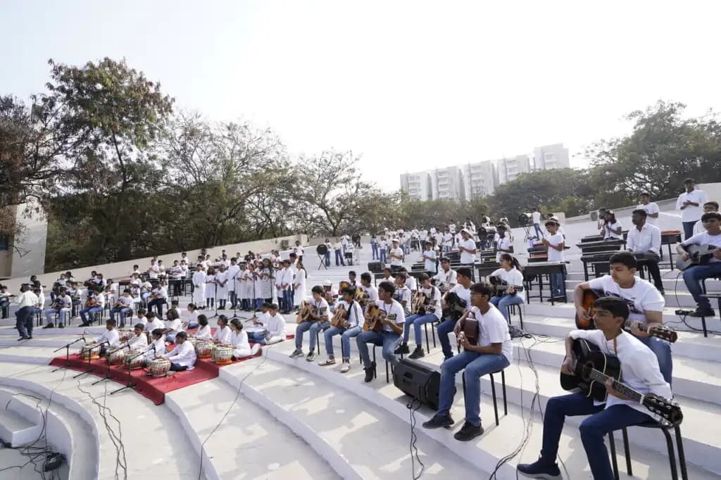 Suchitra students sharing music at an outdoor performance