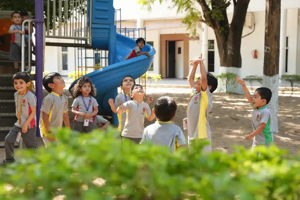 Children playing on the Suchitra campus